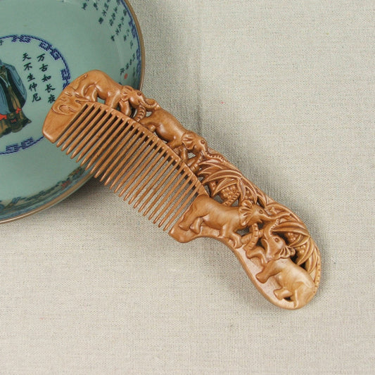 Carved wooden comb