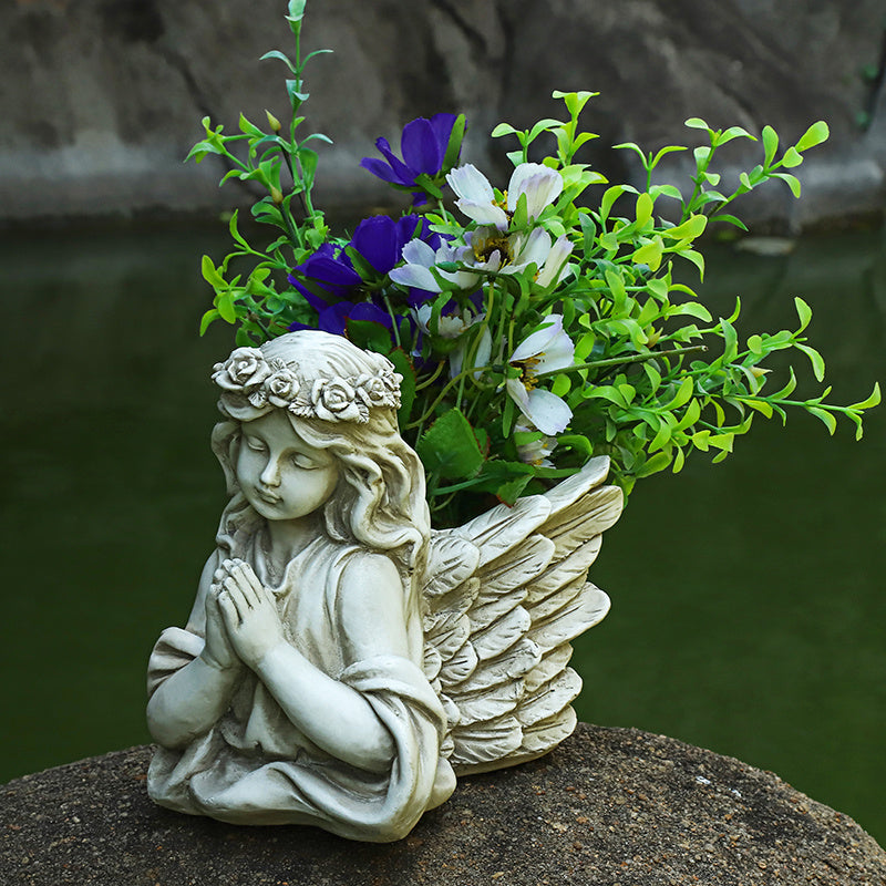 Creative angel flower pot garden layout