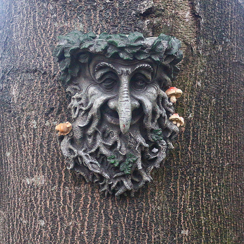 Resin tree face bird feeder