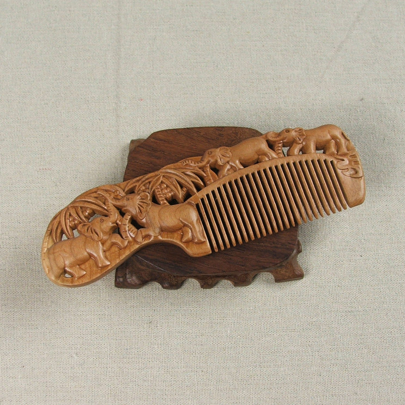 Carved wooden comb