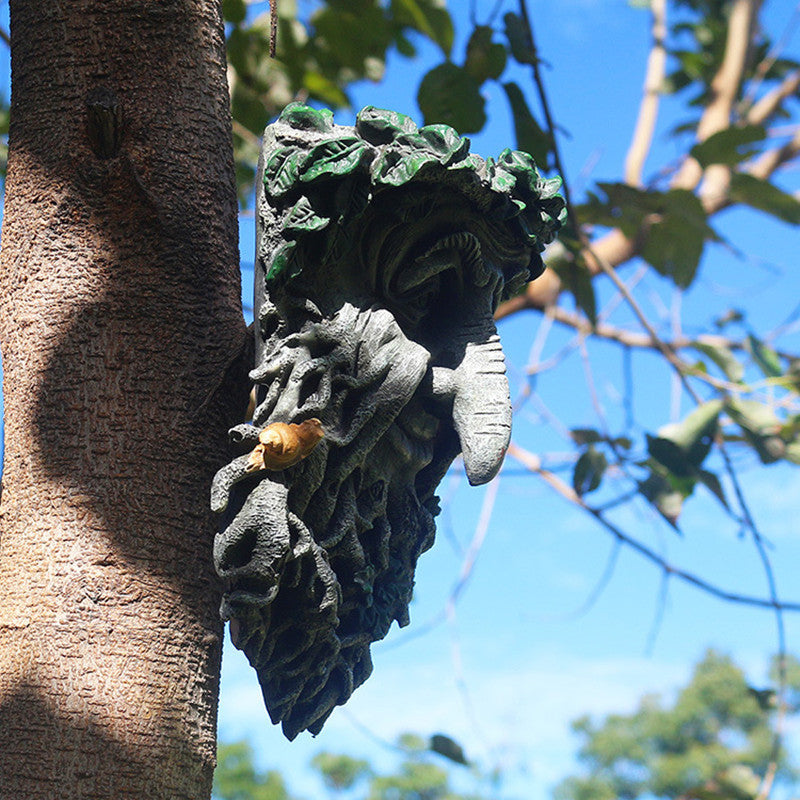 Resin tree face bird feeder