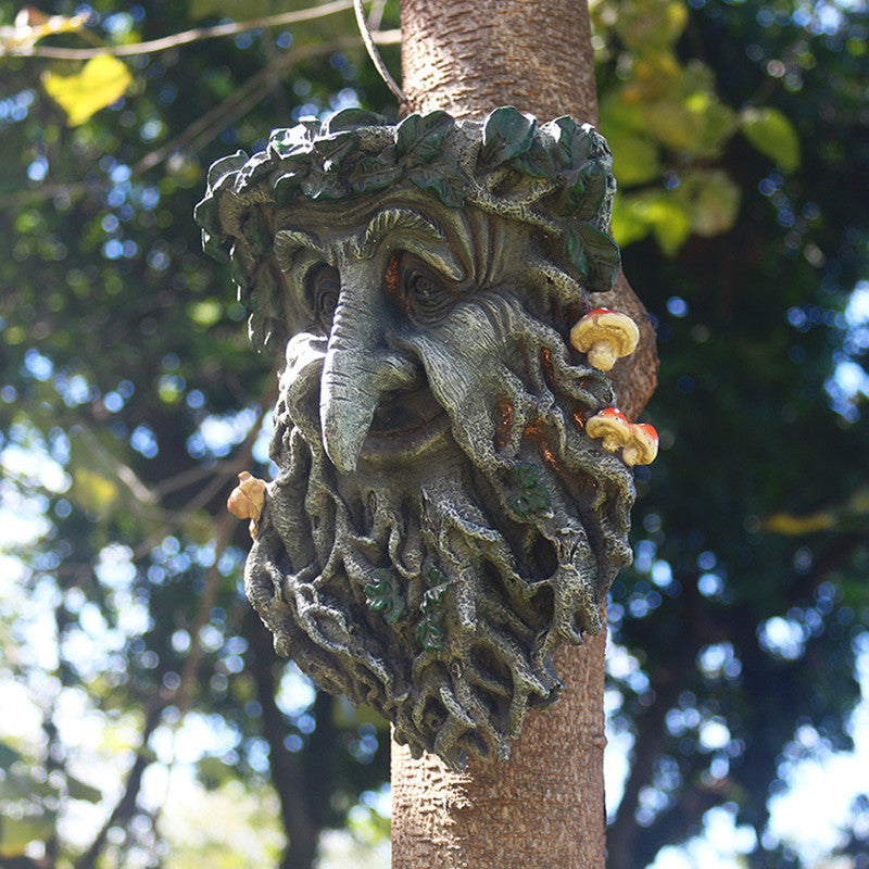 Resin tree face bird feeder