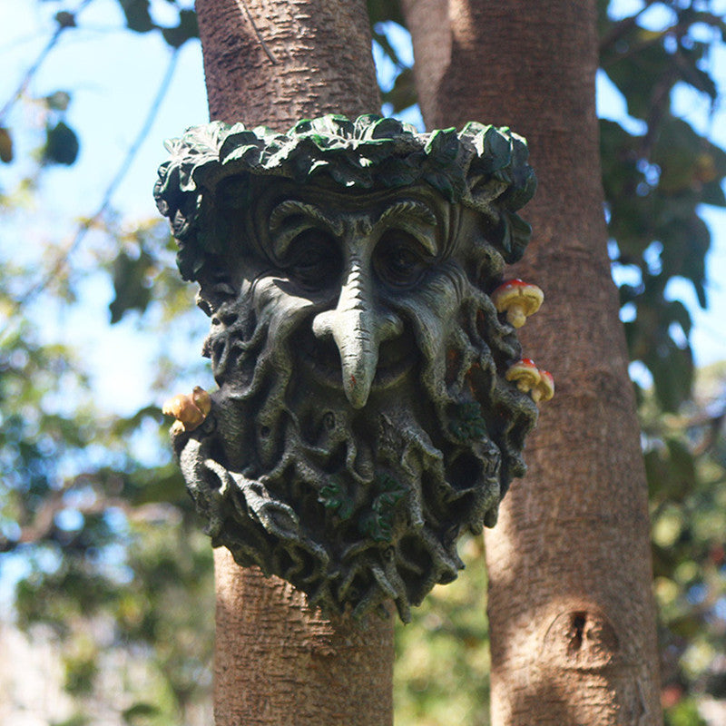 Resin tree face bird feeder