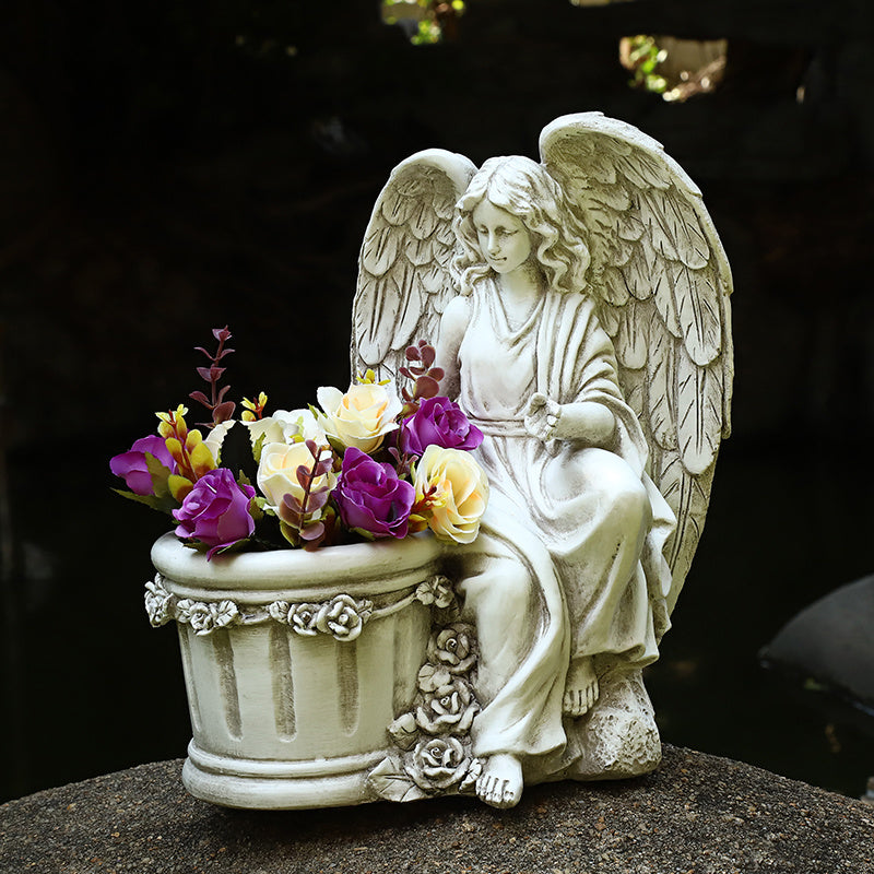 Creative angel flower pot garden layout