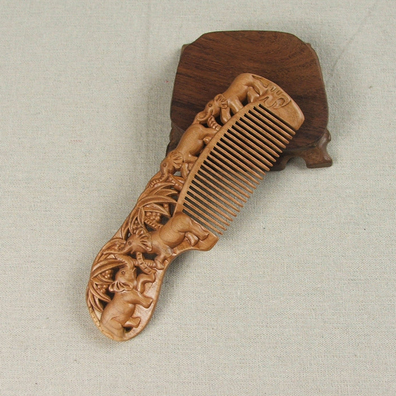 Carved wooden comb