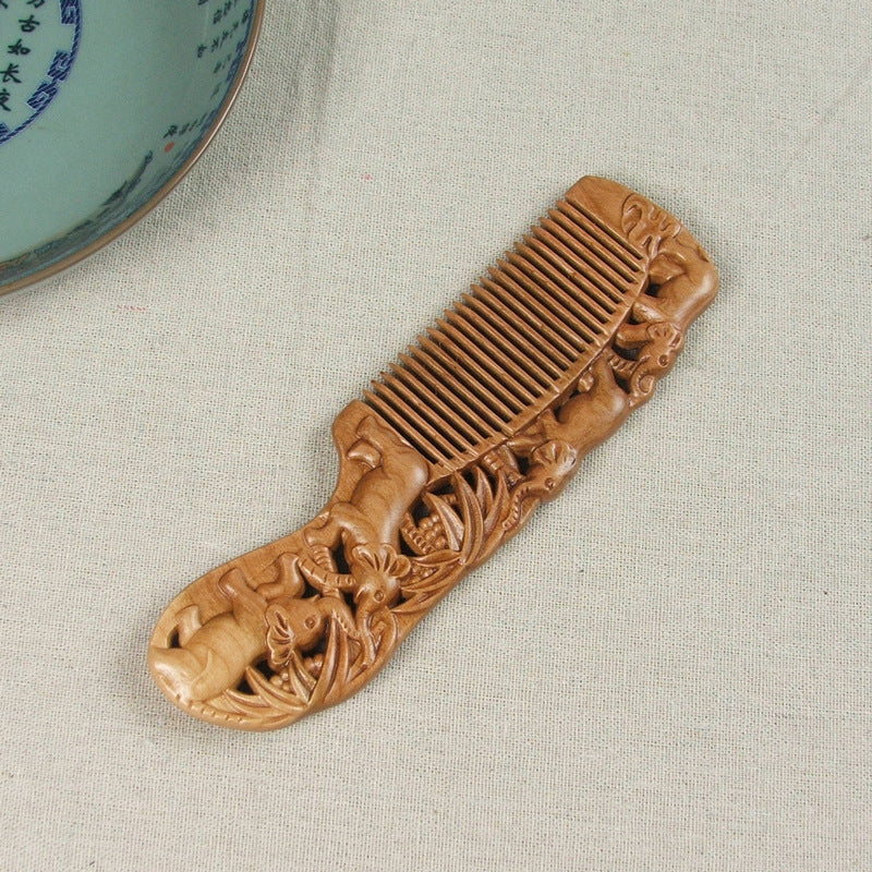 Carved wooden comb